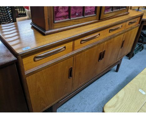 A G-Plan Fresco mid-century retro sideboard, one long cutlery drawer, flanked by two short drawers, above four cupboard doors