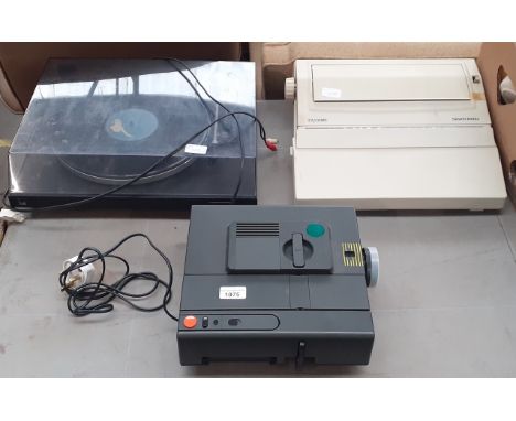 An AGFA slide projector, a Silver Reed electric typewriter (no power lead), and an Audiophile Concept record deck 