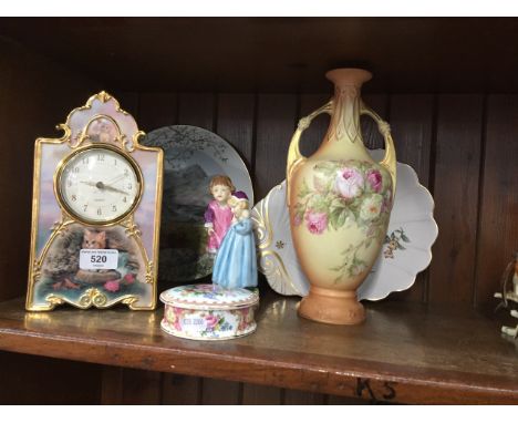A limited edition porcelain clock decorated with 22k gold by Bradford Editions, Royal Worcester Babes in the Wood figure, wit