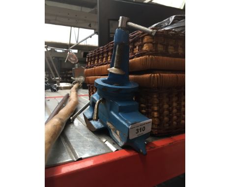 A small bench vice. 