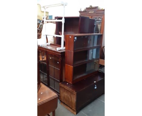 Various items of furniture; a mahogany display cabinet, a painted towel rail, a card table, five glazed mahogany bookcases an