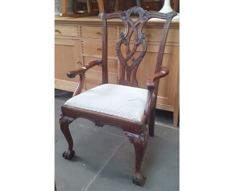 A reproduction Chippendale style mahogany armchair. 