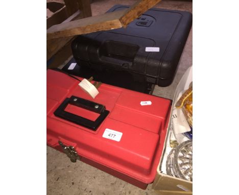 A toolbox with small tools, a cordless drill/driver with charger, and portable record player/tape deck by Sanyo 