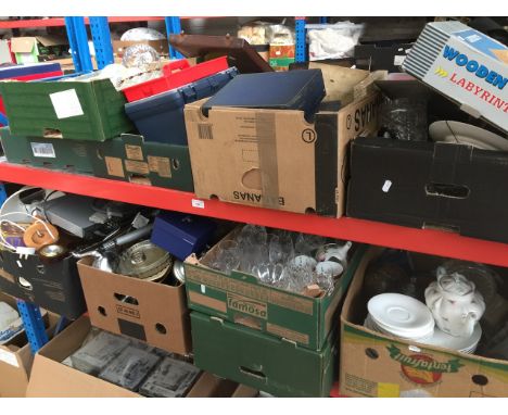 10 boxes of misc ceramics, glass, household and kitchen items, games, part tea sets, pottery, barometer, DVD player, etc. 