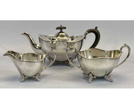 AN ELEGANT 3 PIECE TEA SERVICE on scrolled supports, tea service items, condiments, and a large quantity of other plated ware