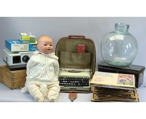 LPs, SLIDE PROJECTOR by Gnome, vintage cased Imperial typewriter, car buoy, porcelain headed doll, metal cash boxes and a woo