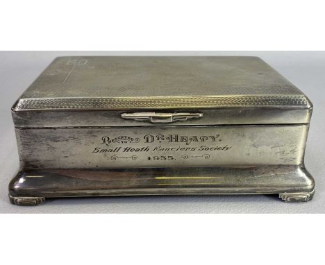 BIRMINGHAM SILVER PRESENTATION CIGARETTE BOX - 1933, Maker Beddoes &amp; Co, engine turned lid with 'H E H' monogrammed carto