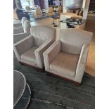 A pair of lounge chairs handmade and designed in Belgium Marie Corner Take a Seat dome back hardwood
