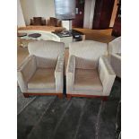 A pair of lounge chairs handmade and designed in Belgium Marie Corner Take a Seat dome back hardwood