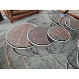 Naos coffee table set finished in Macassar with polished metal frame and glass tops dimensions 80