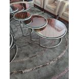 Naos coffee table set finished in Macassar with polished metal frame and glass tops dimensions 80