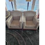 A pair of lounge chairs handmade and designed in Belgium Marie Corner Take a Seat dome back hardwood