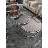Naos coffee table set finished in Macassar with polished metal frame and glass tops dimensions 80