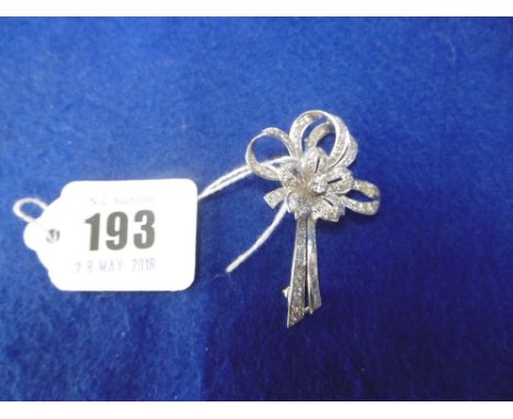 A VINTAGE WHITE METAL AND DIAMOND SPRAY BROOCH