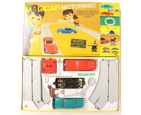 Tri-ang: A boxed, Tri-ang Go Magicar Motoring Set, MG 1, complete, comprising battery powered car with 'Magic Touch' Stop &am