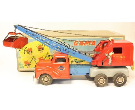 Gama: A boxed, Gama, West Germany, tinplate and plastic lorry mounted excavator.