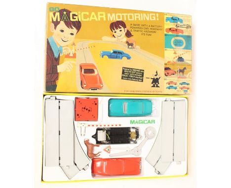 Tri-ang: A boxed, Tri-ang Go Magicar Motoring Set, MG 1, complete, comprising battery powered car with 'Magic Touch' Stop &am