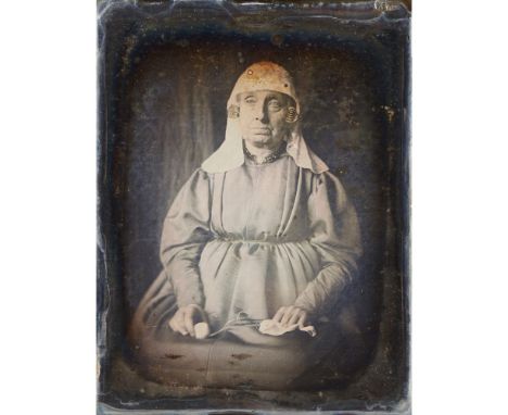 DAGUERREOTYPES2 UNCASED PORTRAITS FROM THE NETHERLANDS portrait of an older woman holding her knitting, wearing fine jeweller
