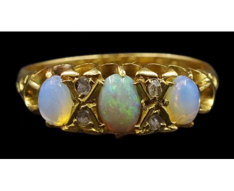 Early 20th century three stone opal ring, with diamond accents set between, Chester 1914Condition Report:Approx 2.45gm, size 