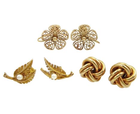 Pair of gold knot stud earrings, pair of flower screw back earrings and one other pair of pearl stud earrings, all hallmarked