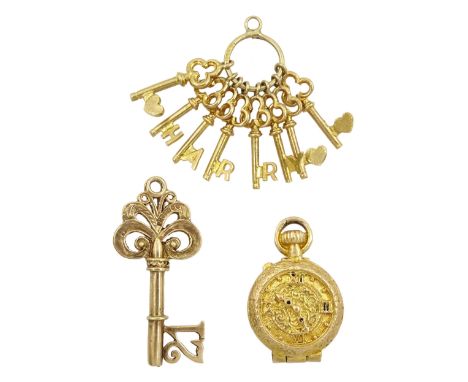 Three 9ct gold pendant/charms including clock and sand timer, 21 key and set of 'Harry' keys, all hallmarkedCondition Report: