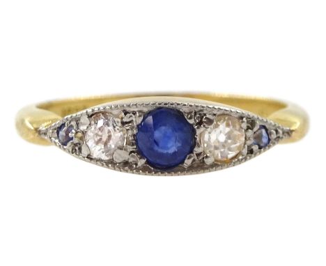 Gold milgrain set five stone diamond and sapphire ring, stamped 18ct, in a velvet and silk lined velvet backCondition Report: