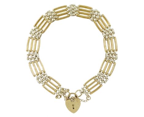 9ct two tone gold four bar gate bracelet, with heart locket clasp, stamped 375Condition Report:Approx 9.8gm