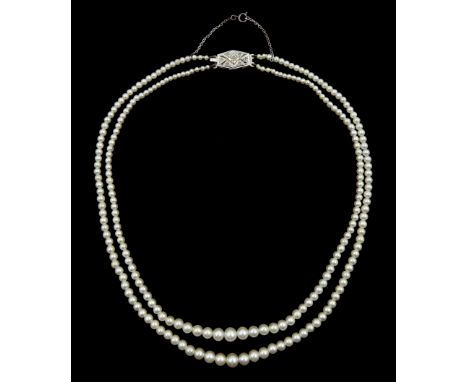 Double strand graduating pearl necklace, on 9ct white gold diamond claspCondition Report:Approx 17.65gm, clasp tested, shorte