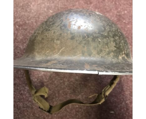 British WWII steel 'Brodie' helmet complete with liner and chin strap, stamped on the rim: F&amp;L 1940 MS,  AVP. In goof con