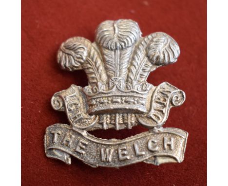 The Welsh Regiment Officers Cap Badge (White-metal), two lugs. K&amp;K: 654. An unusual cast, seems unfinished. 