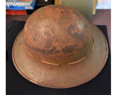 British WWII Civil Defence/Home Front “Zuckerman” steel helmet in military green, complete with correct lining intact. The le