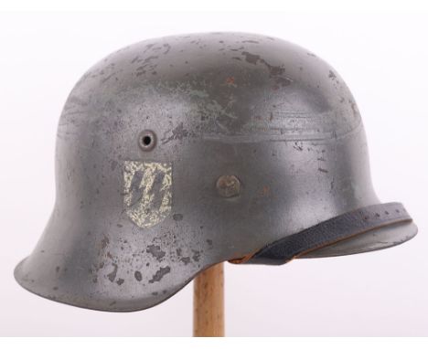 WW2 German M-42 Steel Combat Helmet, being an original helmet which has been repainted grey and in our opinion Waffen-SS rune