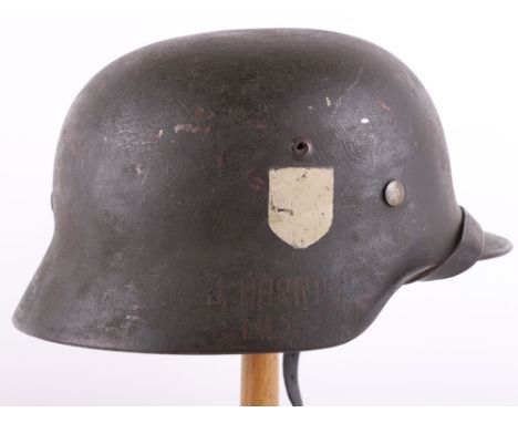 WW2 German Army M-35 Captured and US GI Graffiti War Art Steel Combat Helmet, good example of a combat re-issue M-35 pattern 
