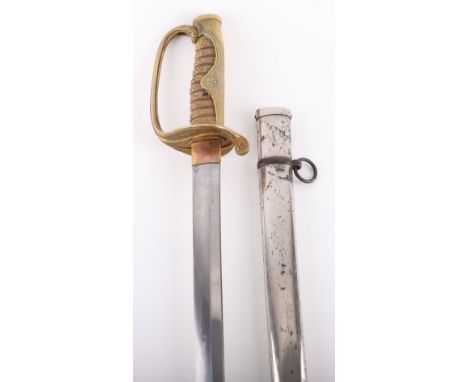 WW2 Japanese Kyu-gunto Sword, having a machine made straight blade. Shark skin grip with wire binding. Brass knuckle bow and 