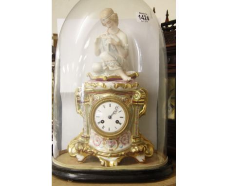 A Bisque French Clock surmounted with a Classical figure the enamel dial with Roman numerals under a glass dome