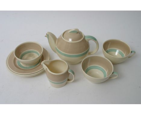A Susie Cooper Kestrel shape 'tea for two' teaset, some damage 