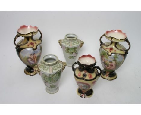A pair of Japanese vases, a garniture of ceramic vases a ships novelty condiment 
