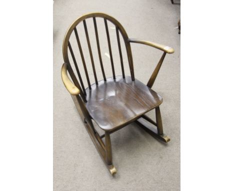 An Ercol child's rocking chair