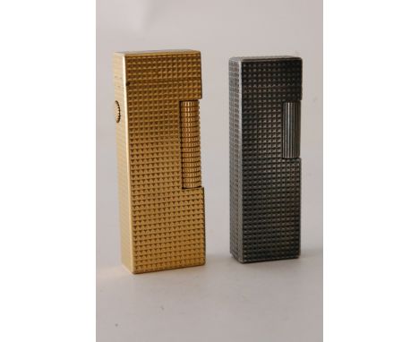 A Dunhill lighter with another by Calibri