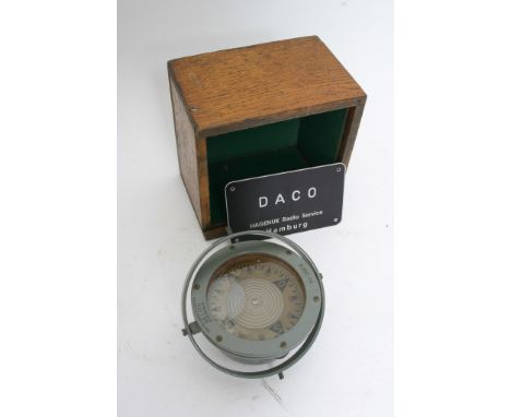 A cased gimbled compass marked for AB Lyth Stockhold