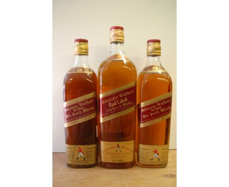 Three old bottles of Johnnie Walker Red Label Old Scotch Whisky