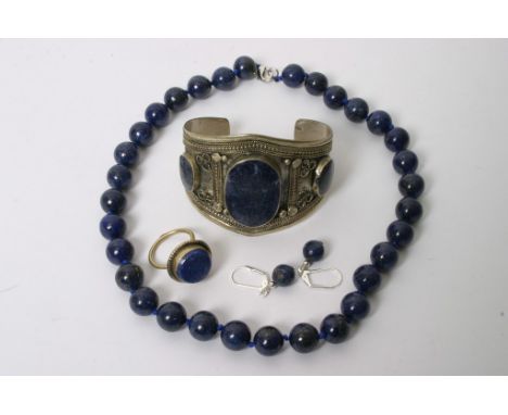 A Lapis Lazuli 12mm necklace, ring, bangle and earrings (5) 