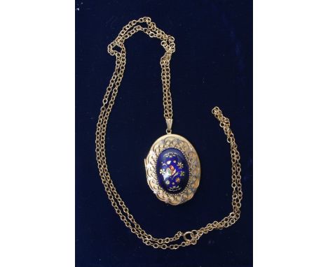 A 9ct gold locket with blue enamel decoration on yellow metal chain