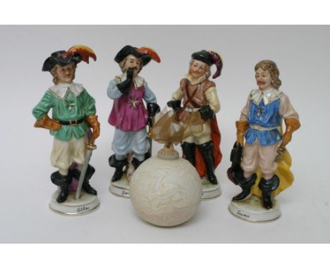 Four ceramic musketeers and a Lladro bauble