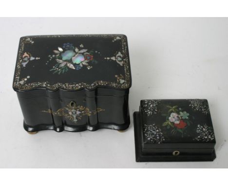 A Victorian inlaid paper mâché tea caddy with two internal sections and a smaller conforming box (2)