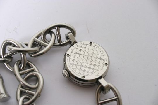 A Gucci Charm Bracelet Watch Model 107
