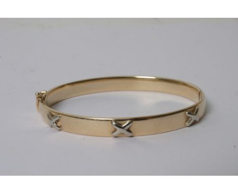 A 9ct gold bangle 