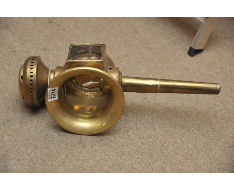 A brass carriage lamp 