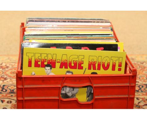 A box containing a collection of LP records including Rockabilly, 60's Garage, Elvis Presley etc