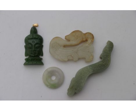 A collection of four Chinese hardstone carvings, possibly jade